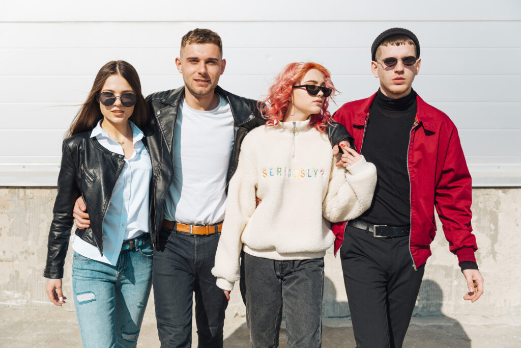 Trending Clothes 2026 – The Latest Fashion Trends Shaping Modern Style young people hugging walking street together